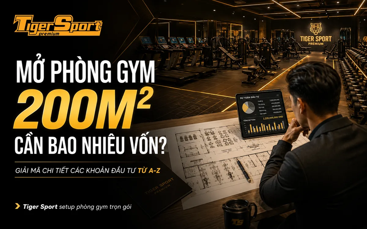 Hình ảnh tổng quan một phòng gym hiện đại 200m2 với trang thiết bị cao cấp, hội viên đang tập luyện và huấn luyện viên hỗ trợ, minh họa cho chi phí mở phòng gym hiệu quả.