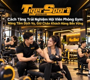 Hình ảnh tổng quan phòng gym hiện đại, hội viên vui vẻ tập luyện và nhân viên thân thiện tại quầy lễ tân, minh họa cho cách tăng trải nghiệm hội viên phòng gym hiệu quả.